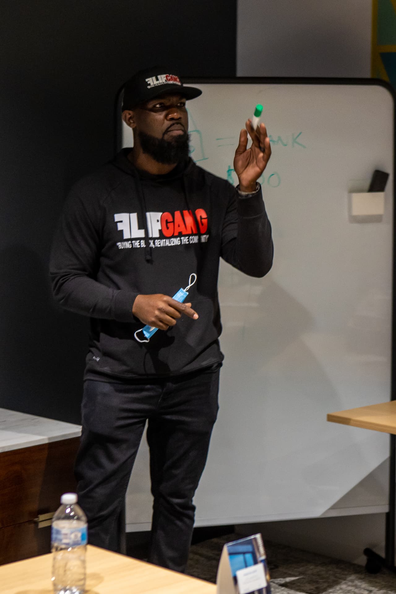 Flip Gang Inc founder teaching a real estate class